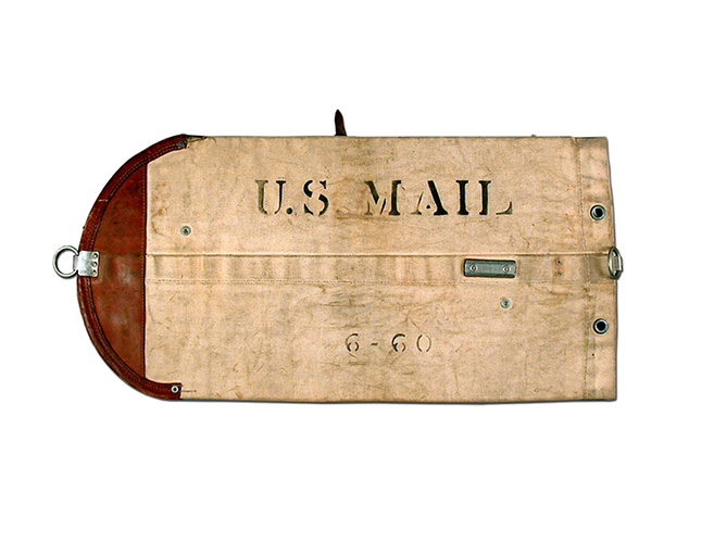 A light and dark brown mail pouch with the words U.S. Mail printed on it.