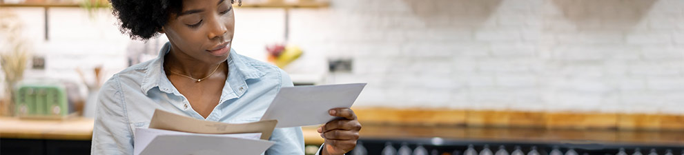 Local small business owner preparing to send mail.