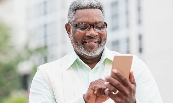 Man holding a smartphone.