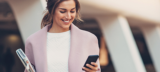 Image of a person checking their smartphone.