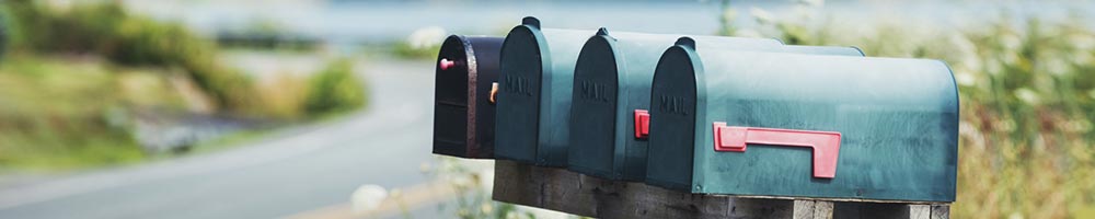 Image of mailboxes in a row.