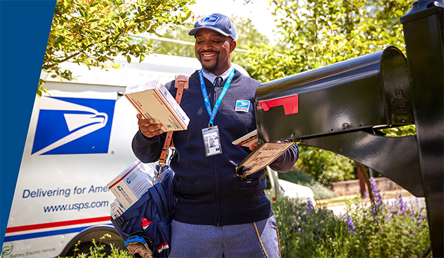 USPS mail truck with mail person outside of it delivering packages.