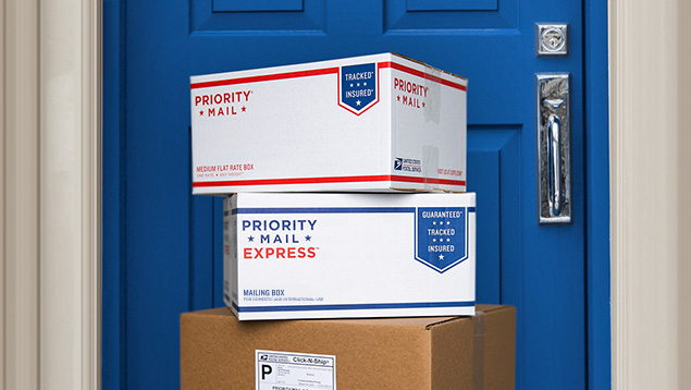 Image Of Stacked Packages In Front A Blue Door