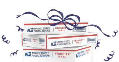 Holiday gifts prepared to be shipped from home using Click-N-Ship with illustrated blue ribbons.
