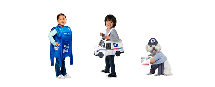 Toddlers wearing USPS Mailbox and Postal Truck costumes; a small dog in a Mail Carrier costume.