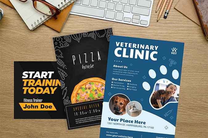 Marketing flyers sitting on a table.