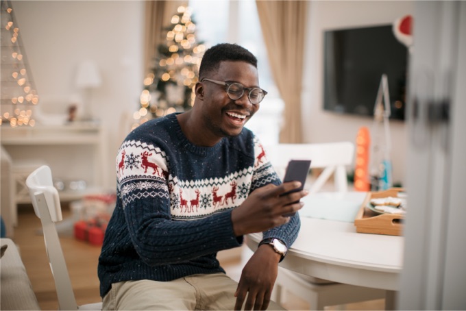 A person checking Informed Delivery preview email on a smartphone.