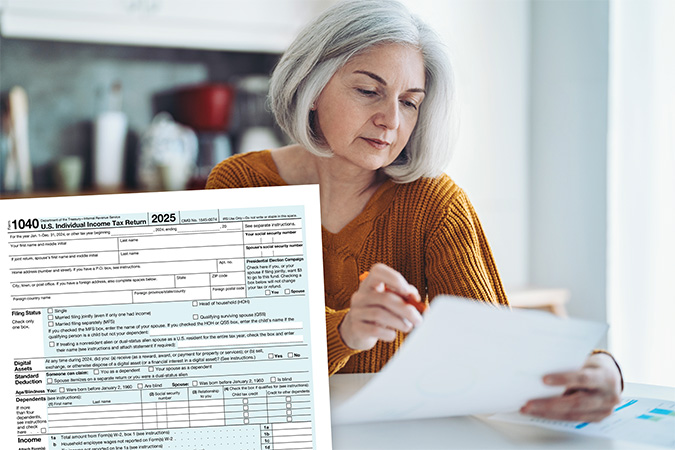 An IRS form 1040 and a person filling out a form.
