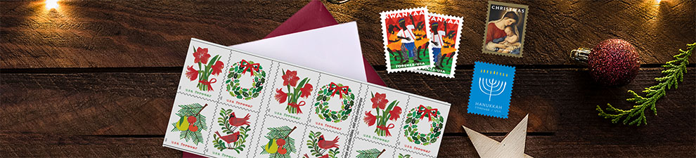 Holiday stamps on a desk.